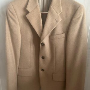 100%  camel hair sport coat. Great addition to your Fall & Winter wardrobe